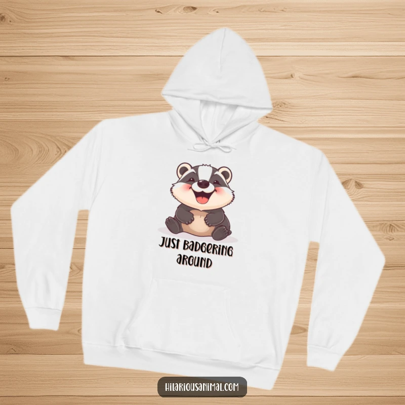 Funny Badger Hoodie featuring a super happy badger rolling playfully on the ground, radiating infectious glee and comfort for outdoor fun.