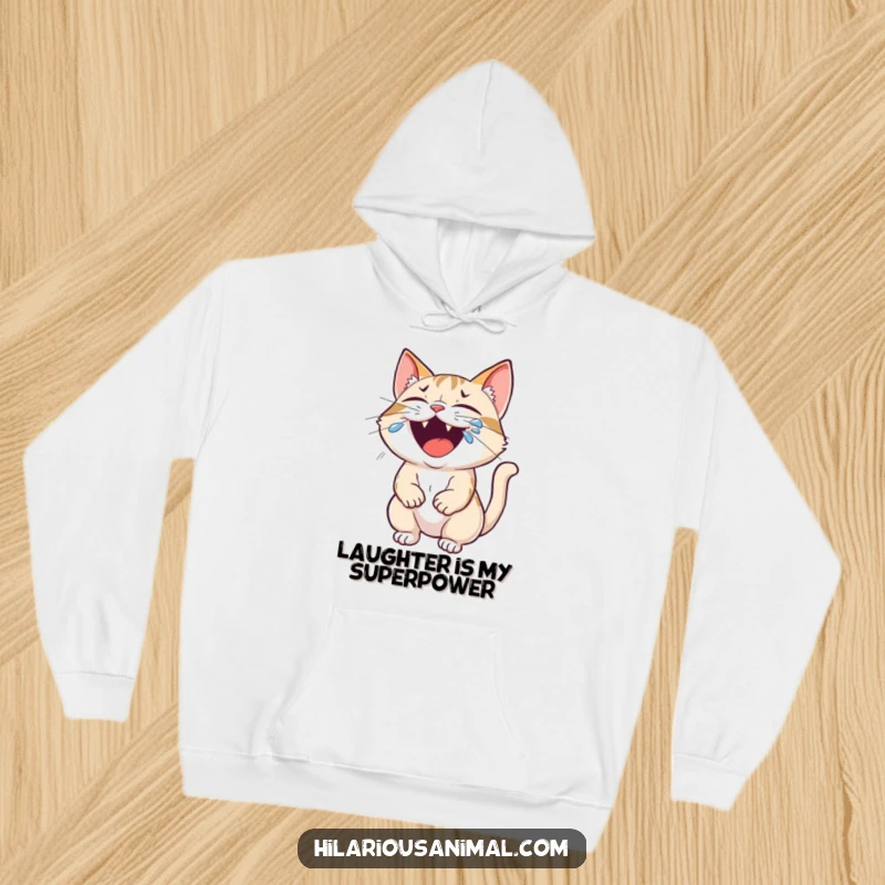 Funny cat hoodie showing a small feline roaring with laughter, tears streaming down its furry face, a cozy comedic statement.
