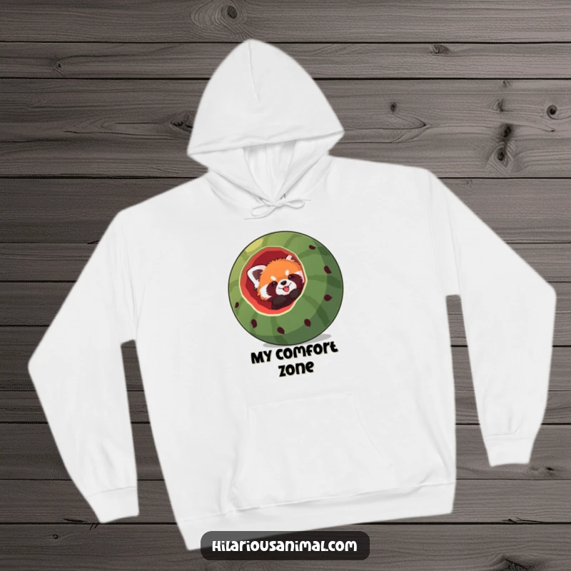Funny red panda hoodie, a red panda hilariously stuck headfirst in a giant hollowed-out watermelon, radiating adorable confusion and charm.