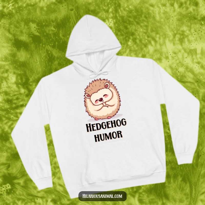 Funny small hedgehog curled into a ball, shaking with silent laughter, featured on a cozy hoodie, perfect for heartwarming amusement.