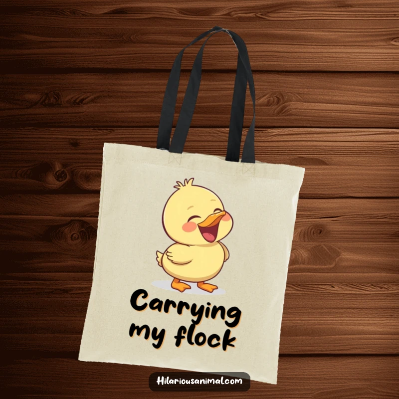 Funny duckling tote bag, showcasing a cheerful bird laughing heartily, a durable and humorous accessory.