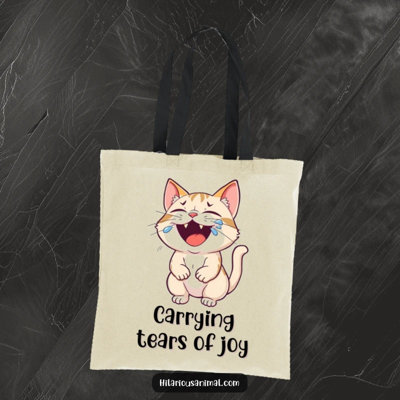 Funny cat tote bag with a small cat roaring with laughter, tears streaming from its eyes, a delightful and practical accessory.